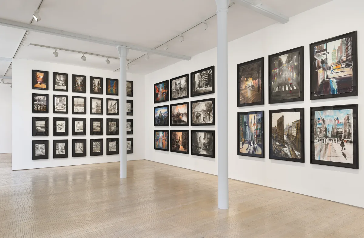 Gallery view showing the full Artisan Paper Collection displayed across three walls