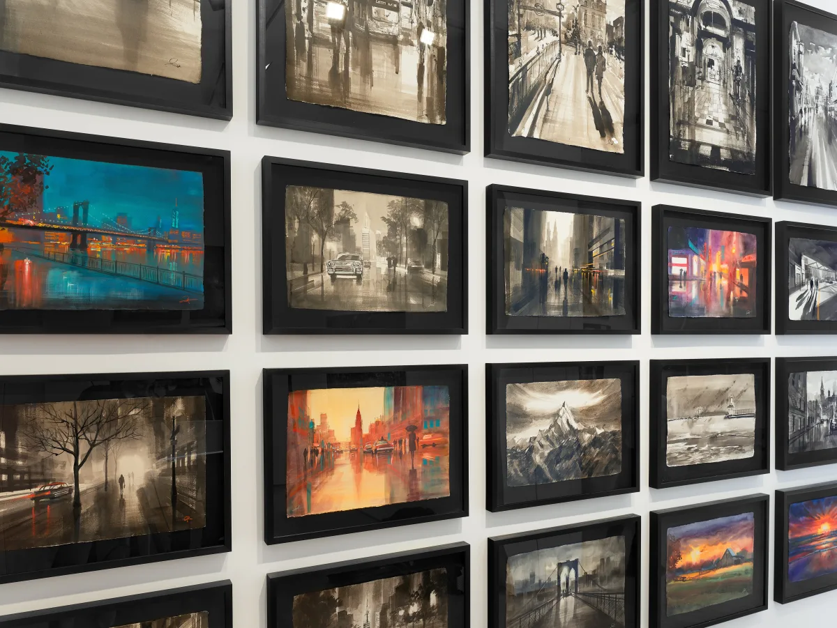 Close-up angled view of artisan paper works in floating frames