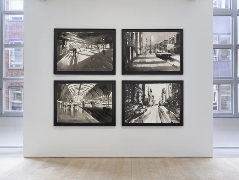 Four monochrome ink wash paintings of train stations and city streets, lit by natural window light